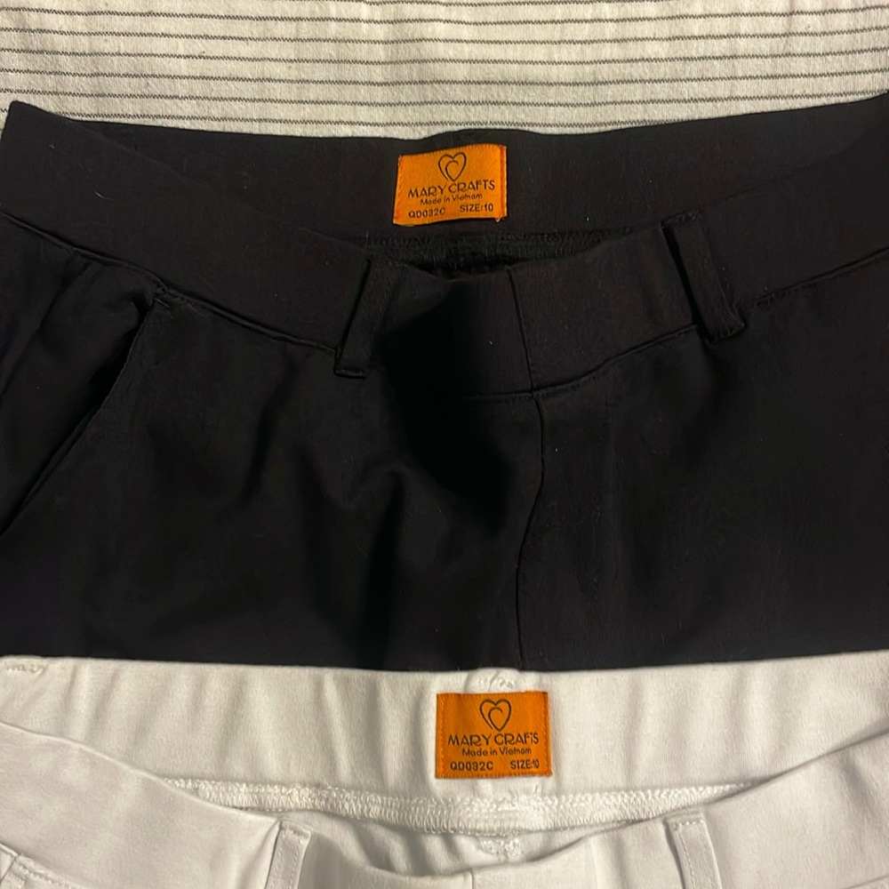 2 pairs of pull on pants - white and black